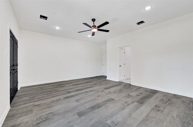 7922 Sealey St, Houston, TX 77088 - spare room with a ceiling fan, wood finished floors, and recessed lighting