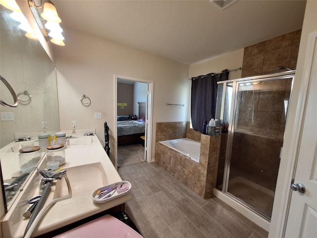 20331 Weeping Pine Way, Richmond, TX 77407 - full bathroom featuring a garden tub, a stall shower, double vanity, and ensuite bath