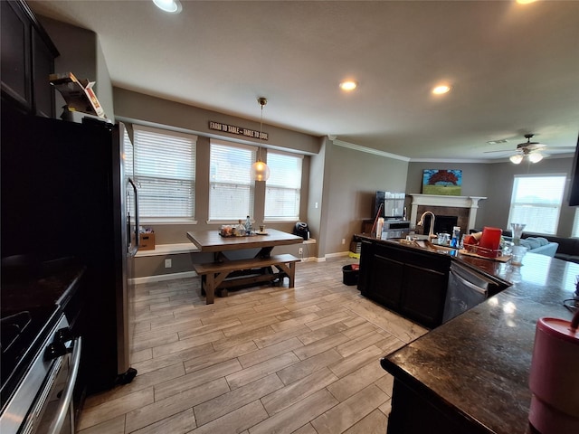 20331 Weeping Pine Way, Richmond, TX 77407 - kitchen with range, dishwasher, open floor plan, a ceiling fan, and recessed lighting