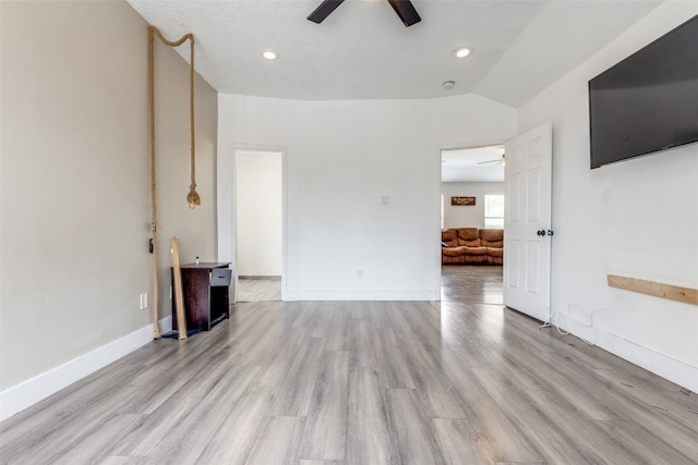 3038 Rainmont Ln, Katy, TX 77449 - unfurnished living room featuring ceiling fan, light wood finished floors, recessed lighting, and vaulted ceiling