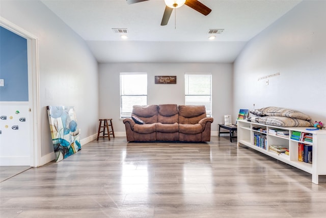 3038 Rainmont Ln, Katy, TX 77449 - living area featuring lofted ceiling, ceiling fan, and wood finished floors