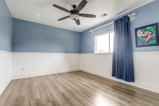 3038 Rainmont Ln, Katy, TX 77449 - unfurnished room with wood finished floors and a ceiling fan