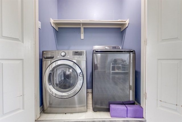 3038 Rainmont Ln, Katy, TX 77449 - laundry area featuring washing machine and dryer