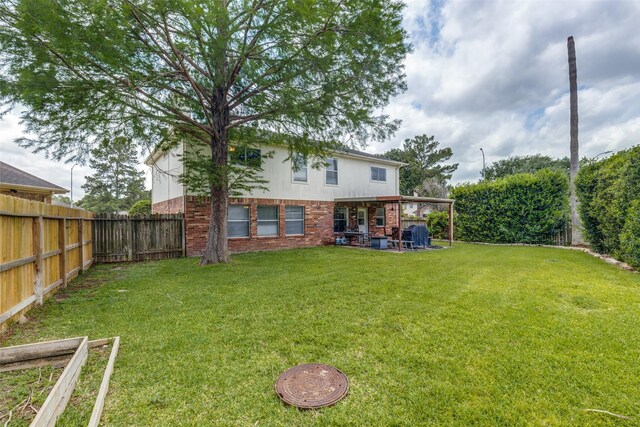 3038 Rainmont Ln, Katy, TX 77449 - fenced backyard featuring a patio