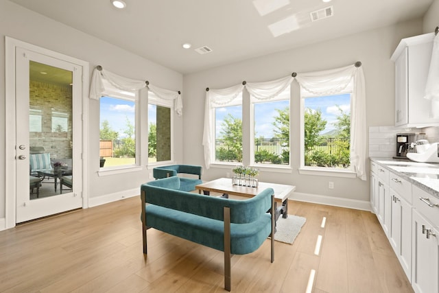 6919 Shoreline View Dr, Katy, TX 77493 - sitting room with light wood-type flooring and recessed lighting