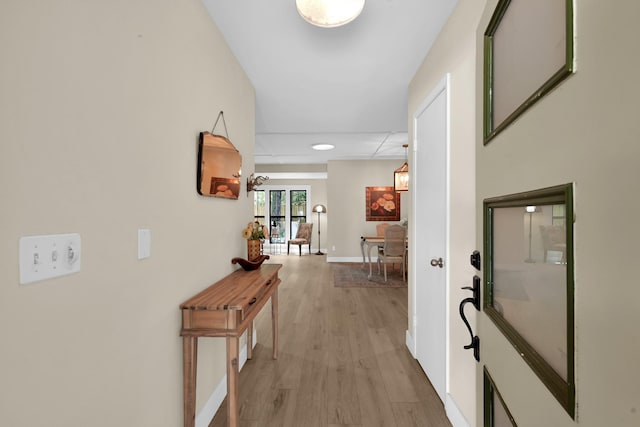 58 Sandpebble Dr, Spring, TX 77381 - hall featuring light wood finished floors and baseboards