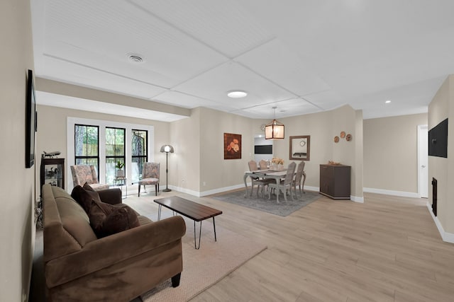 58 Sandpebble Dr, Spring, TX 77381 - living room with light wood-style floors and recessed lighting