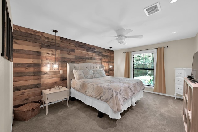 58 Sandpebble Dr, Spring, TX 77381 - carpeted bedroom featuring wood walls, recessed lighting, and a ceiling fan