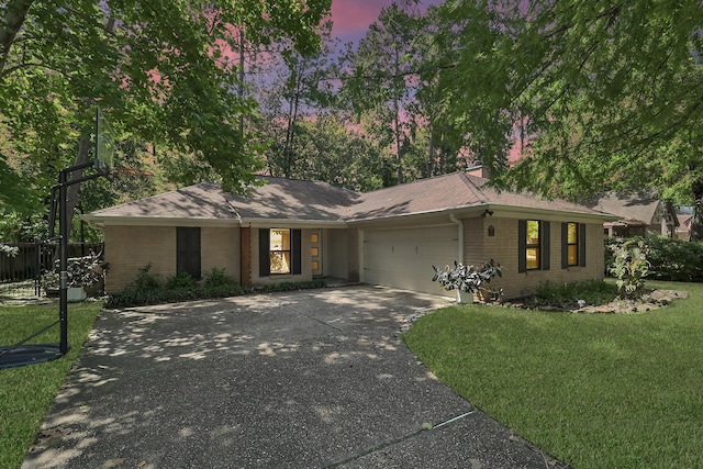 58 Sandpebble Dr, Spring, TX 77381 - view of front facade featuring an attached garage, brick siding, driveway, and a shingled roof