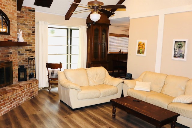 1108 Easy St, Rosenberg, TX 77471 - living area featuring a ceiling fan, a brick fireplace, wood finished floors, and beamed ceiling