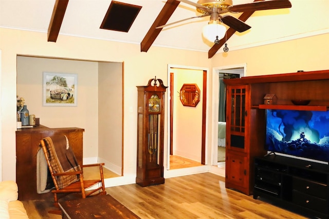 1108 Easy St, Rosenberg, TX 77471 - living room with beam ceiling, a ceiling fan, and wood finished floors