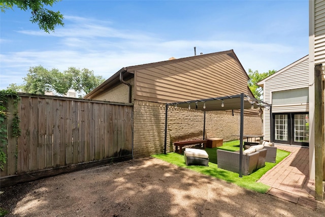 8033 Oakwood Forest Dr, Houston, TX 77040 - view of patio / terrace with an outdoor hangout area and french doors