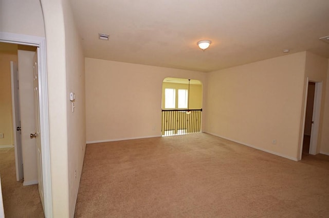 4202 Misty Waters Ln, Katy, TX 77494 - carpeted spare room featuring baseboards and arched walkways