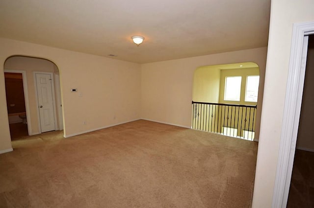 4202 Misty Waters Ln, Katy, TX 77494 - carpeted spare room with arched walkways and baseboards