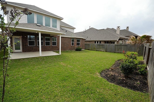 4202 Misty Waters Ln, Katy, TX 77494 - fenced backyard featuring a patio