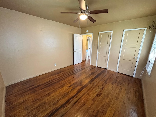 2066 Earl St, Beaumont, TX 77703 - unfurnished bedroom with dark wood-type flooring and a ceiling fan