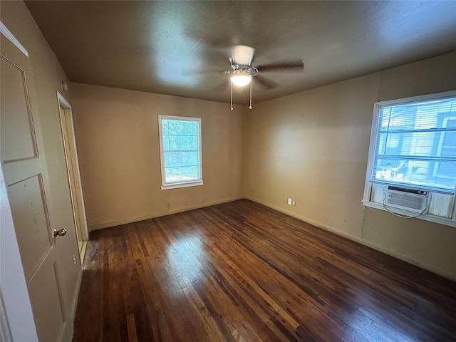 2066 Earl St, Beaumont, TX 77703 - empty room with dark wood-style flooring and a ceiling fan