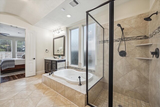 5119 Kendalia Cloud Ln, Fulshear, TX 77441 - bathroom featuring a stall shower, a whirlpool tub, vanity, ensuite bath, and tile patterned floors