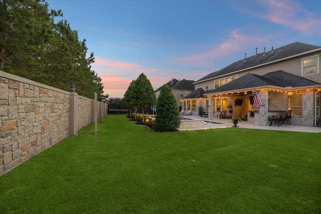 5119 Kendalia Cloud Ln, Fulshear, TX 77441 - fenced backyard with a patio