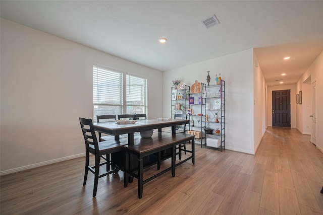 7227 Birchville Dr, Rosharon, TX 77583 - dining space featuring light wood-style floors and recessed lighting