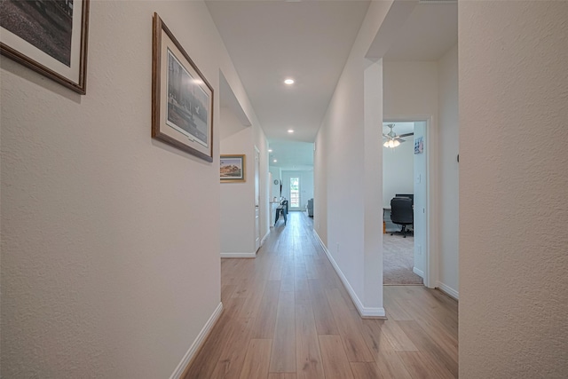 7227 Birchville Dr, Rosharon, TX 77583 - corridor with light wood-type flooring, recessed lighting, and a textured wall