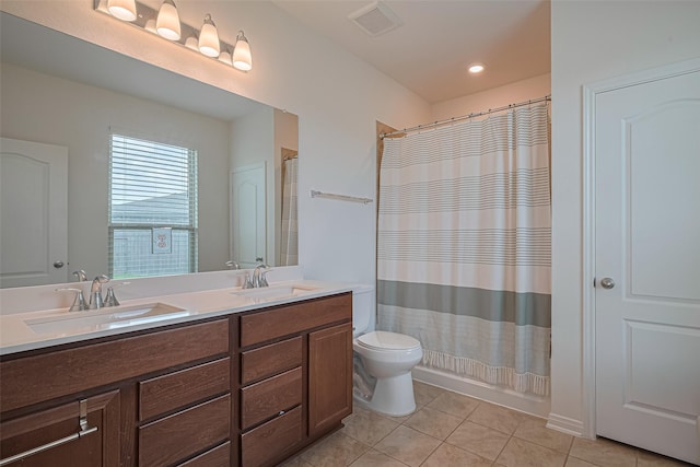 7227 Birchville Dr, Rosharon, TX 77583 - full bathroom featuring tile patterned flooring, double vanity, and curtained shower