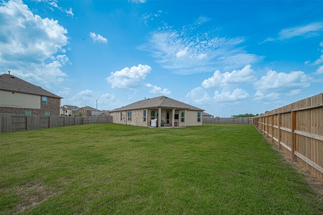 7227 Birchville Dr, Rosharon, TX 77583 - rear view of house featuring a fenced backyard and a patio area
