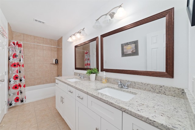 12712 Plummersville St, Houston, TX 77072 - full bathroom featuring double vanity, tile patterned flooring, and shower / bathtub combination with curtain