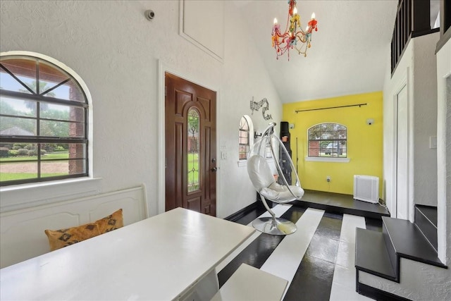 7510 Shadow Creek Dr, Beaumont, TX 77707 - entryway with high vaulted ceiling and a chandelier
