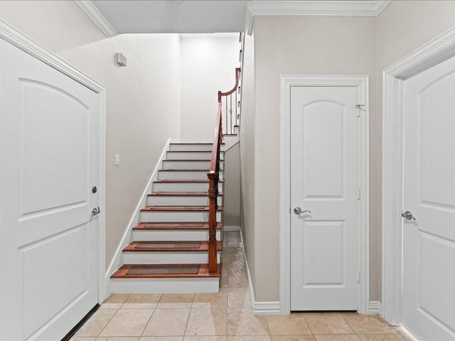 405 Reinerman St, Houston, TX 77007 - staircase featuring tile patterned floors and crown molding