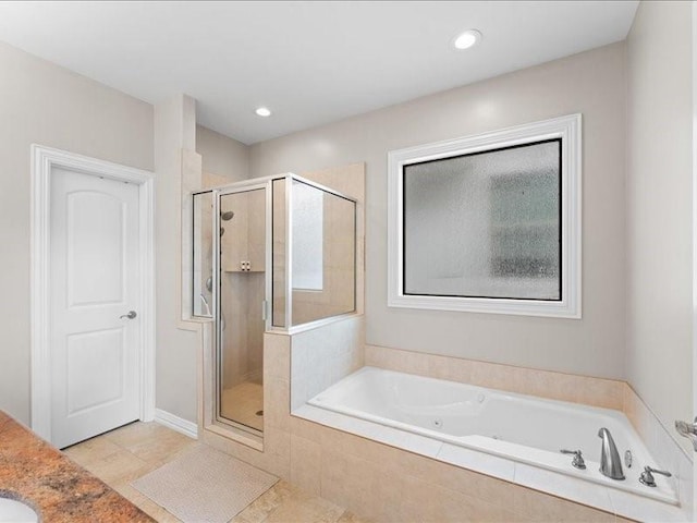 405 Reinerman St, Houston, TX 77007 - bathroom featuring a shower stall, a whirlpool tub, recessed lighting, and tile patterned flooring