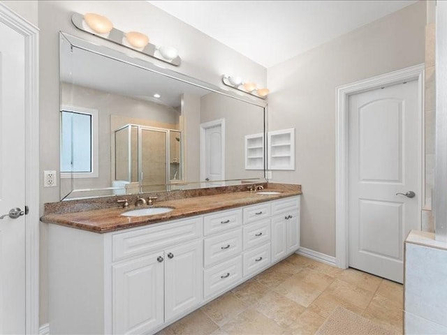 405 Reinerman St, Houston, TX 77007 - bathroom featuring double vanity and a shower stall