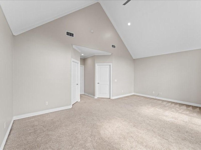 405 Reinerman St, Houston, TX 77007 - empty room with light colored carpet, high vaulted ceiling, and recessed lighting