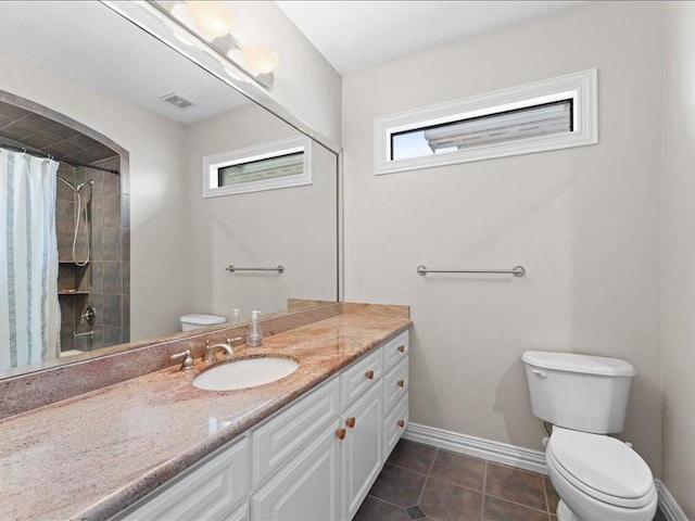 405 Reinerman St, Houston, TX 77007 - bathroom with vanity, a shower with curtain, and tile patterned flooring