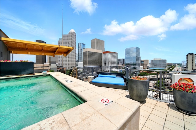 2000 Bagby St Unit 5423, Houston, TX 77002 - community pool featuring a view of skyline