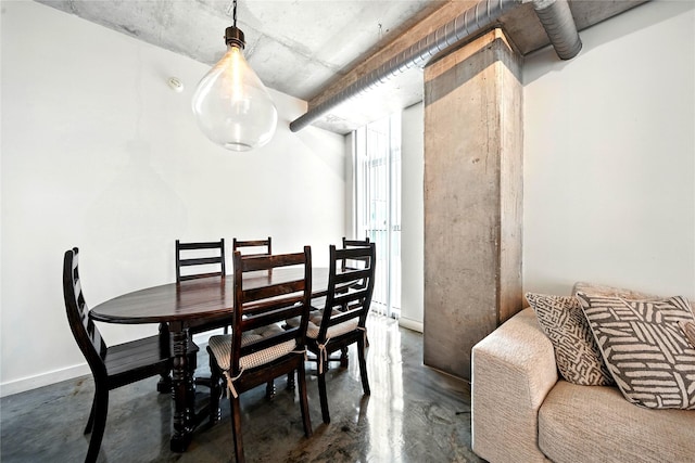 2000 Bagby St Unit 5423, Houston, TX 77002 - dining room featuring concrete floors and baseboards