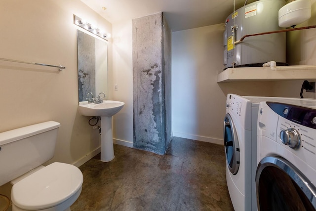 2000 Bagby St Unit 5423, Houston, TX 77002 - laundry area with washing machine and clothes dryer and electric water heater