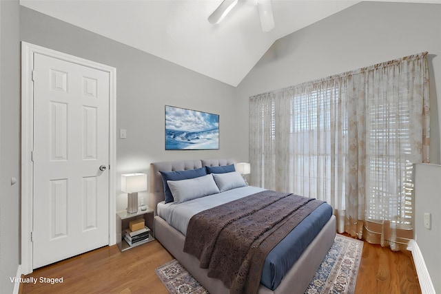 13314 Kaylee Ln, Santa Fe, TX 77510 - bedroom featuring wood finished floors, lofted ceiling, and ceiling fan