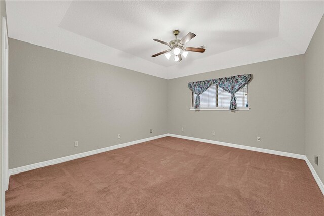 13314 Kaylee Ln, Santa Fe, TX 77510 - unfurnished room featuring carpet floors, a ceiling fan, and a raised ceiling