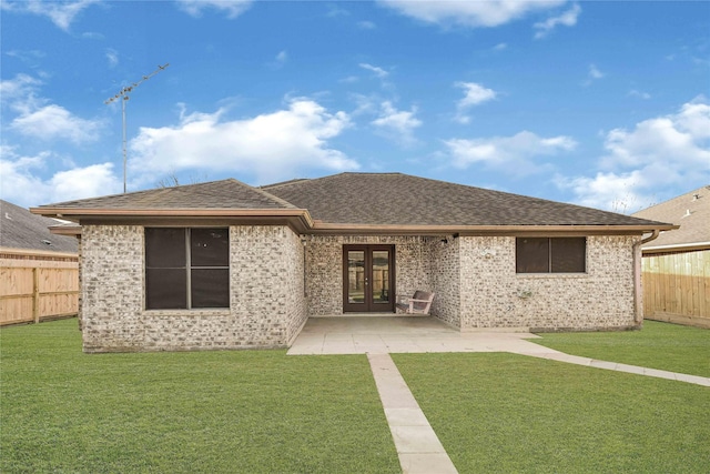13314 Kaylee Ln, Santa Fe, TX 77510 - rear view of property with french doors, a fenced backyard, a shingled roof, and brick siding
