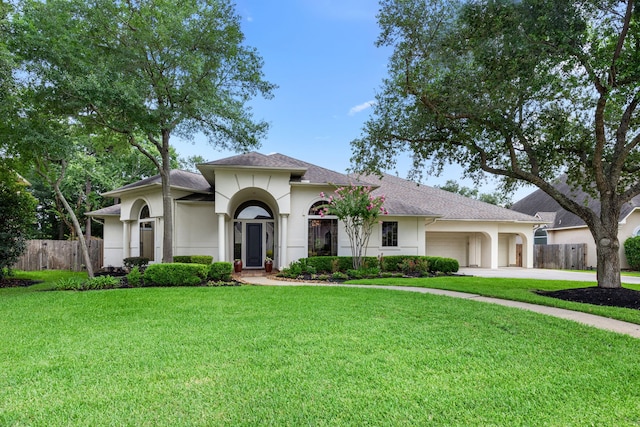 13722 Vinery Ln, Cypress, TX 77429 - view of front of property with an attached garage, stucco siding, driveway, and a shingled roof