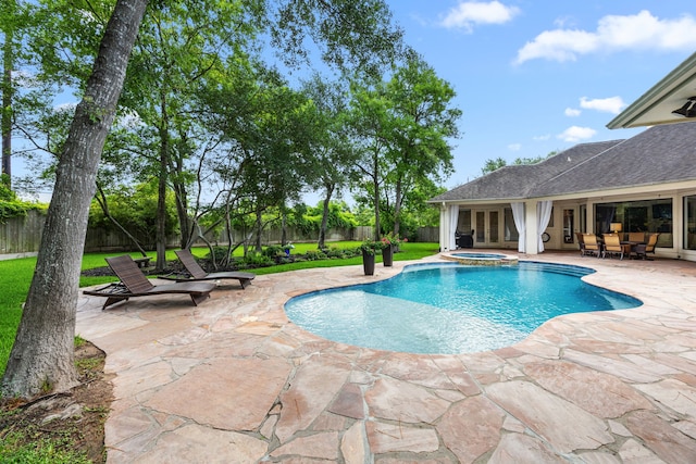 13722 Vinery Ln, Cypress, TX 77429 - view of pool featuring french doors, a patio area, a fenced backyard, and a pool with connected hot tub