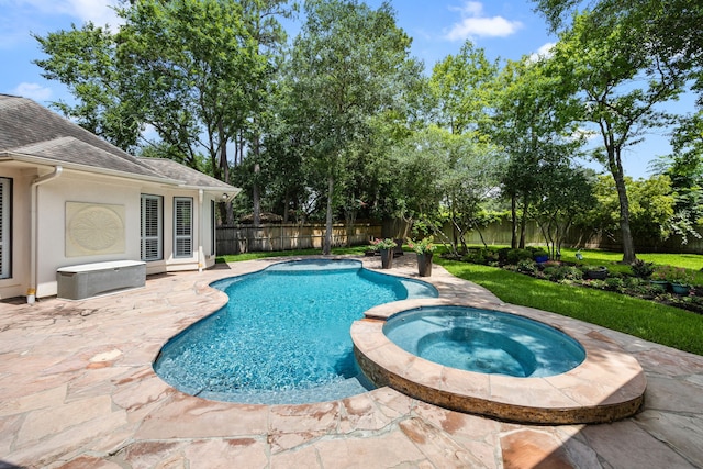 13722 Vinery Ln, Cypress, TX 77429 - view of swimming pool featuring a patio area, a fenced backyard, and a pool with connected hot tub