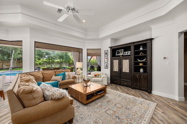 13722 Vinery Ln, Cypress, TX 77429 - living room with crown molding, light wood-style flooring, a ceiling fan, and recessed lighting