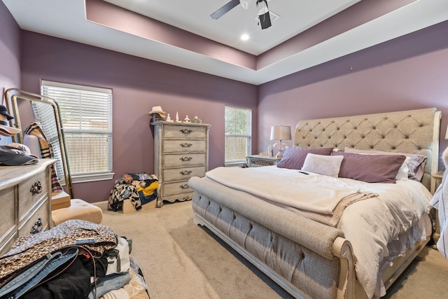 2619 Portland Ave, College Station, TX 77845 - carpeted bedroom with a raised ceiling and a ceiling fan