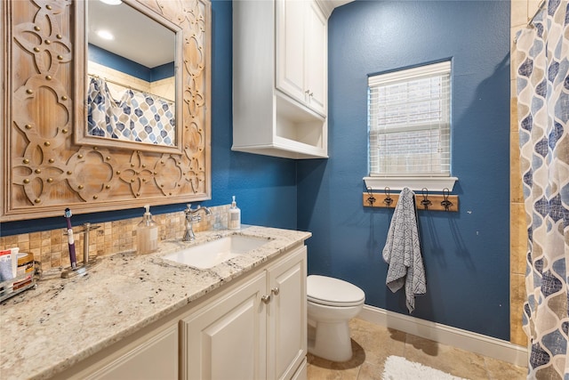 2619 Portland Ave, College Station, TX 77845 - bathroom with vanity, a shower with curtain, tile patterned floors, and backsplash