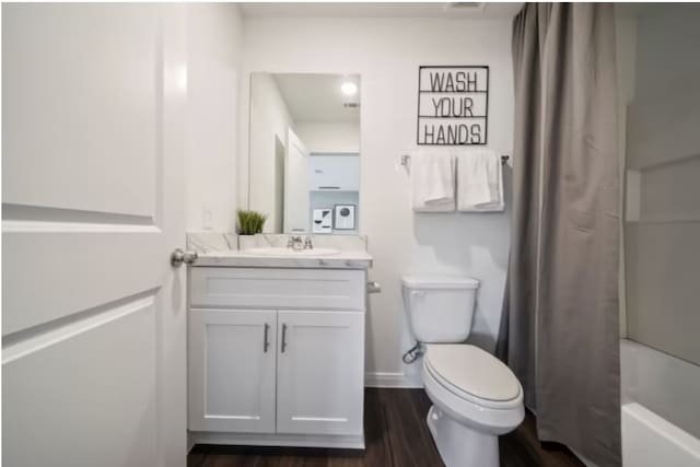16424 Windy Cove Ct, Conroe, TX 77378 - bathroom with vanity, wood finished floors, and shower / tub combo