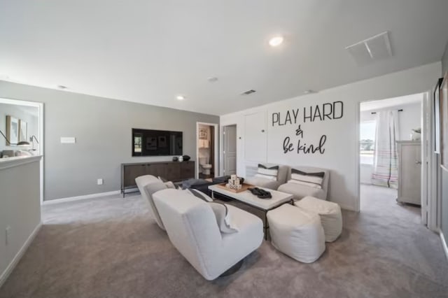 16424 Windy Cove Ct, Conroe, TX 77378 - carpeted living area with baseboards and recessed lighting