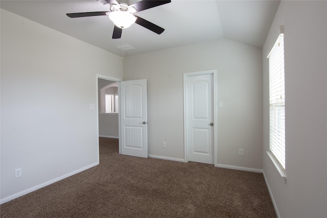 18723 Pilot Knolls Dr, Cypress, TX 77433 - unfurnished bedroom featuring carpet flooring, vaulted ceiling, ceiling fan, and arched walkways
