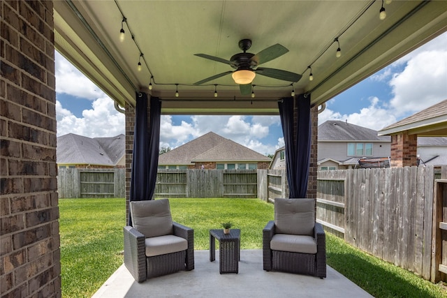 18723 Pilot Knolls Dr, Cypress, TX 77433 - fenced backyard with ceiling fan and a patio
